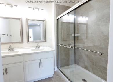 Stunning new construction home with a bright open layout with on Little Creek Country Club in West Virginia - for sale on GolfHomes.com, golf home, golf lot