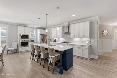 Welcome to 2165 Palm Pointe NE, a beautiful Bill Clark Legacy on Compass Pointe Golf Course in North Carolina - for sale on GolfHomes.com, golf home, golf lot