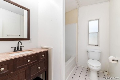 Remodeled manufactured home in lovely waterfront golf course on Tanglewood Shores Golf Club in Virginia - for sale on GolfHomes.com, golf home, golf lot