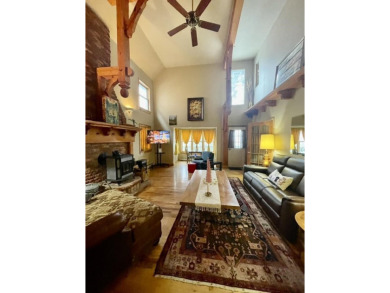 Timber framed, tri-level home with partially finished basement on The Lodge Golf Course in New Mexico - for sale on GolfHomes.com, golf home, golf lot