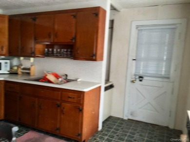 Sold as is.

3 minutes to the ski slopes and across the street on Windham Country Club in New York - for sale on GolfHomes.com, golf home, golf lot