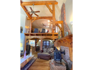 Timber framed, tri-level home with partially finished basement on The Lodge Golf Course in New Mexico - for sale on GolfHomes.com, golf home, golf lot