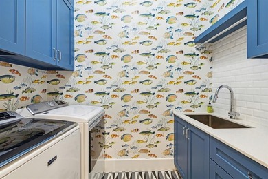 Overlooking the harbor, amphitheater and iconic Hennybay Bridge on Long Cove Golf Course in Texas - for sale on GolfHomes.com, golf home, golf lot