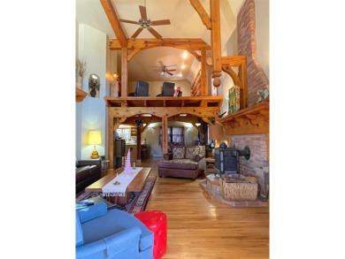 Timber framed, tri-level home with partially finished basement on The Lodge Golf Course in New Mexico - for sale on GolfHomes.com, golf home, golf lot