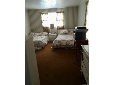 Sold as is.

3 minutes to the ski slopes and across the street on Windham Country Club in New York - for sale on GolfHomes.com, golf home, golf lot