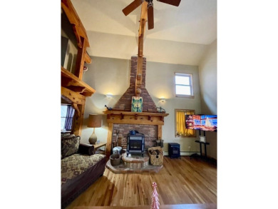 Timber framed, tri-level home with partially finished basement on The Lodge Golf Course in New Mexico - for sale on GolfHomes.com, golf home, golf lot