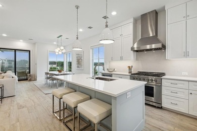 Overlooking the harbor, amphitheater and iconic Hennybay Bridge on Long Cove Golf Course in Texas - for sale on GolfHomes.com, golf home, golf lot