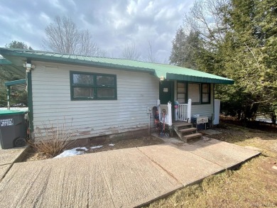 Sold as is.

3 minutes to the ski slopes and across the street on Windham Country Club in New York - for sale on GolfHomes.com, golf home, golf lot