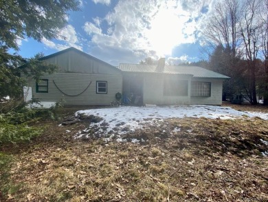 Sold as is.

3 minutes to the ski slopes and across the street on Windham Country Club in New York - for sale on GolfHomes.com, golf home, golf lot