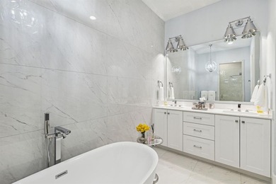 Overlooking the harbor, amphitheater and iconic Hennybay Bridge on Long Cove Golf Course in Texas - for sale on GolfHomes.com, golf home, golf lot