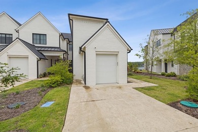 Overlooking the harbor, amphitheater and iconic Hennybay Bridge on Long Cove Golf Course in Texas - for sale on GolfHomes.com, golf home, golf lot