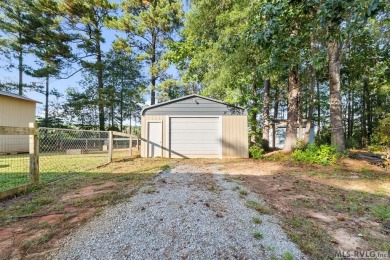 Remodeled manufactured home in lovely waterfront golf course on Tanglewood Shores Golf Club in Virginia - for sale on GolfHomes.com, golf home, golf lot