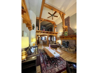 Timber framed, tri-level home with partially finished basement on The Lodge Golf Course in New Mexico - for sale on GolfHomes.com, golf home, golf lot