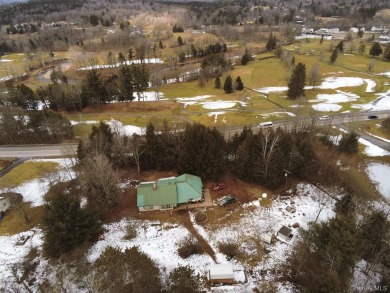 Sold as is.

3 minutes to the ski slopes and across the street on Windham Country Club in New York - for sale on GolfHomes.com, golf home, golf lot