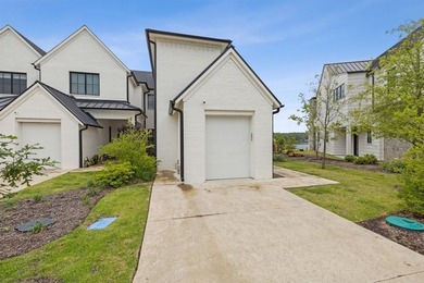 Perched above the harbor with sweeping sunset views across the on Long Cove Golf Course in Texas - for sale on GolfHomes.com, golf home, golf lot