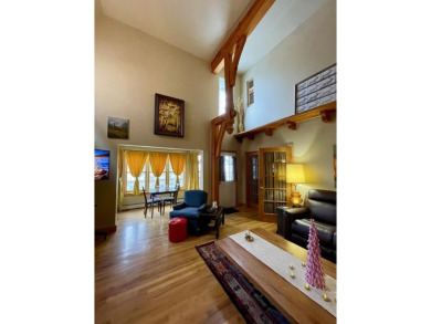 Timber framed, tri-level home with partially finished basement on The Lodge Golf Course in New Mexico - for sale on GolfHomes.com, golf home, golf lot