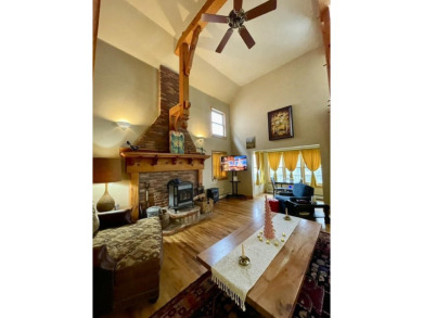 Timber framed, tri-level home with partially finished basement on The Lodge Golf Course in New Mexico - for sale on GolfHomes.com, golf home, golf lot