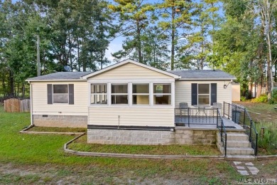 Remodeled manufactured home in lovely waterfront golf course on Tanglewood Shores Golf Club in Virginia - for sale on GolfHomes.com, golf home, golf lot
