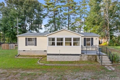 Remodeled manufactured home in lovely waterfront golf course on Tanglewood Shores Golf Club in Virginia - for sale on GolfHomes.com, golf home, golf lot