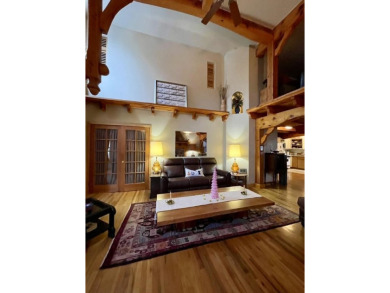 Timber framed, tri-level home with partially finished basement on The Lodge Golf Course in New Mexico - for sale on GolfHomes.com, golf home, golf lot