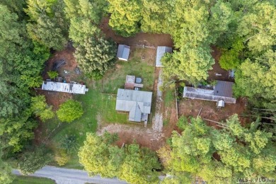 Remodeled manufactured home in lovely waterfront golf course on Tanglewood Shores Golf Club in Virginia - for sale on GolfHomes.com, golf home, golf lot