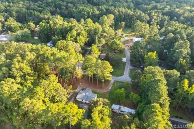 Remodeled manufactured home in lovely waterfront golf course on Tanglewood Shores Golf Club in Virginia - for sale on GolfHomes.com, golf home, golf lot