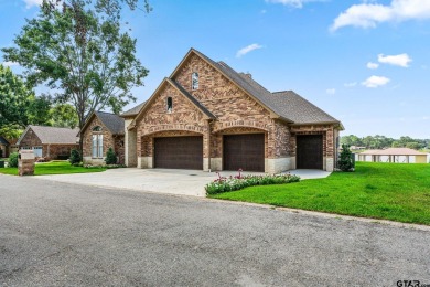 Step into the grand entrance of this exquisite lakehouse and be on Emerald Bay Club in Texas - for sale on GolfHomes.com, golf home, golf lot