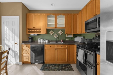 Spacious end-unit townhouse located in Ellington Woods at Dunes on Dunes West Golf Club in South Carolina - for sale on GolfHomes.com, golf home, golf lot