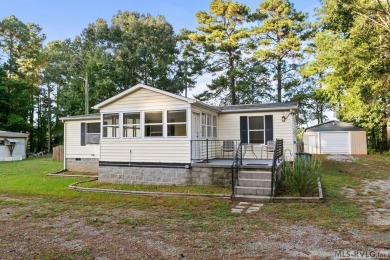 Remodeled manufactured home in lovely waterfront golf course on Tanglewood Shores Golf Club in Virginia - for sale on GolfHomes.com, golf home, golf lot
