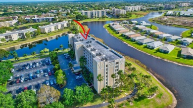 Beautiful corner unit, completely renovated, impact windows 3/8 on Marina Lakes Golf Course in Florida - for sale on GolfHomes.com, golf home, golf lot