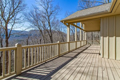 Discover your mountain retreat offering sweeping views of Lake on Lake Toxaway Country Club in North Carolina - for sale on GolfHomes.com, golf home, golf lot