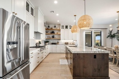 2023 Parade home is located on the 1rst hole in the Fairways on The Ledges Golf Club in Utah - for sale on GolfHomes.com, golf home, golf lot