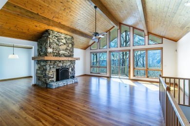 Discover your mountain retreat offering sweeping views of Lake on Lake Toxaway Country Club in North Carolina - for sale on GolfHomes.com, golf home, golf lot