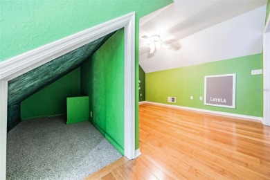 This stunning 3-bedroom, 2-bathroom home (with a loft serving as on Westchase Golf Club in Florida - for sale on GolfHomes.com, golf home, golf lot