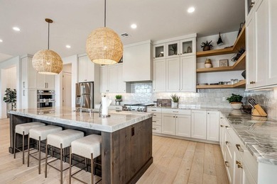 2023 Parade home is located on the 1rst hole in the Fairways on The Ledges Golf Club in Utah - for sale on GolfHomes.com, golf home, golf lot