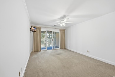 Courtyard entrance and elegance to this Pawleys Plantation on Pawleys Plantation Golf and Country Club in South Carolina - for sale on GolfHomes.com, golf home, golf lot
