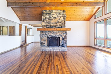 Discover your mountain retreat offering sweeping views of Lake on Lake Toxaway Country Club in North Carolina - for sale on GolfHomes.com, golf home, golf lot