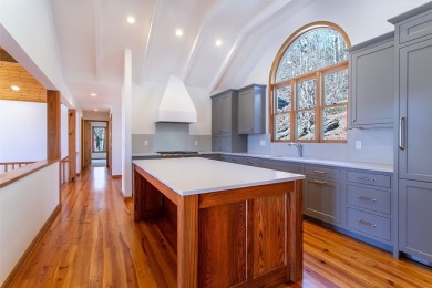 Discover your mountain retreat offering sweeping views of Lake on Lake Toxaway Country Club in North Carolina - for sale on GolfHomes.com, golf home, golf lot