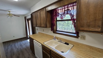 Welcome to market this Charming 3-bedroom, 2-bath home located on Indian Hills Country Club in Arkansas - for sale on GolfHomes.com, golf home, golf lot