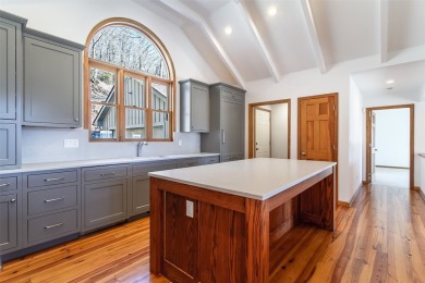 Discover your mountain retreat offering sweeping views of Lake on Lake Toxaway Country Club in North Carolina - for sale on GolfHomes.com, golf home, golf lot