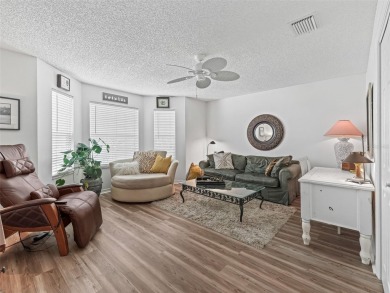 Spacious 3/2 Juniper in Sunset Pointe with Enclosed Lanai on The Links of Spruce Creek in Florida - for sale on GolfHomes.com, golf home, golf lot