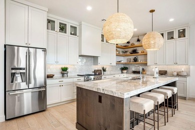 2023 Parade home is located on the 1rst hole in the Fairways on The Ledges Golf Club in Utah - for sale on GolfHomes.com, golf home, golf lot