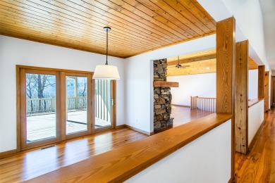 Discover your mountain retreat offering sweeping views of Lake on Lake Toxaway Country Club in North Carolina - for sale on GolfHomes.com, golf home, golf lot