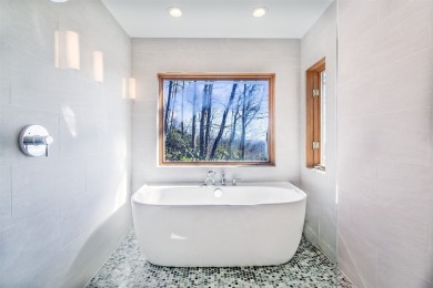 Discover your mountain retreat offering sweeping views of Lake on Lake Toxaway Country Club in North Carolina - for sale on GolfHomes.com, golf home, golf lot