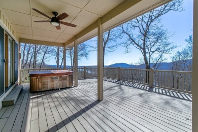 Discover your mountain retreat offering sweeping views of Lake on Lake Toxaway Country Club in North Carolina - for sale on GolfHomes.com, golf home, golf lot