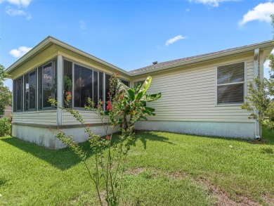 Spacious 3/2 Juniper in Sunset Pointe with Enclosed Lanai on The Links of Spruce Creek in Florida - for sale on GolfHomes.com, golf home, golf lot