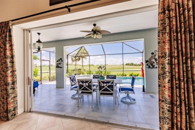 This stunning Mediterranean style stucco home is on a golf on Venetian Golf and River Club in Florida - for sale on GolfHomes.com, golf home, golf lot