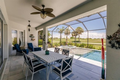 This stunning Mediterranean style stucco home is on a golf on Venetian Golf and River Club in Florida - for sale on GolfHomes.com, golf home, golf lot