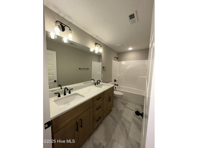 Beautiful 4 bedroom 2.5 bath NEW CONSTRUCTION by Brown Family on Woodlake Country Club in North Carolina - for sale on GolfHomes.com, golf home, golf lot