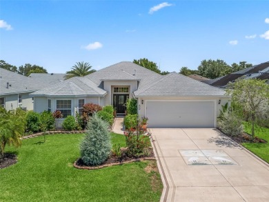 Spacious 3/2 Juniper in Sunset Pointe with Enclosed Lanai on The Links of Spruce Creek in Florida - for sale on GolfHomes.com, golf home, golf lot